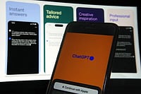 Associated Press : OpenAI’s ChatGPT app is displayed on an iPhone in New York, May 18, 2023.